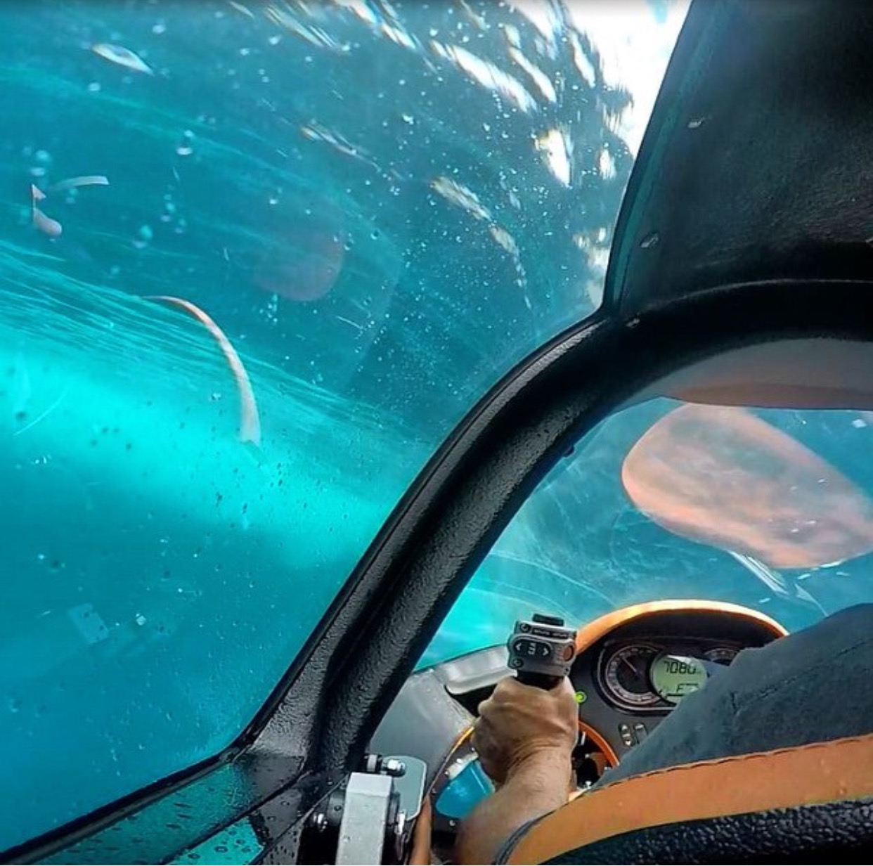 Seabreacher watercraft on the water surface with canopy open